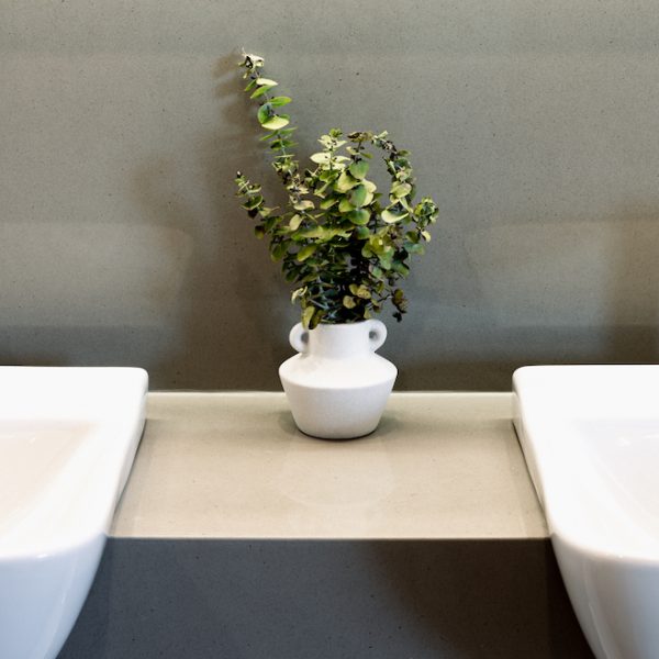 Concrete granite on vanity and splashback